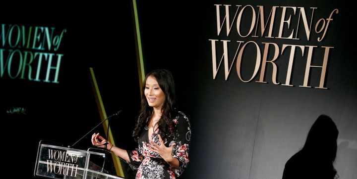Okamoto speaks on stage at the L'Oreal Paris Women of Worth Celebration on Nov. 16, 2016. 