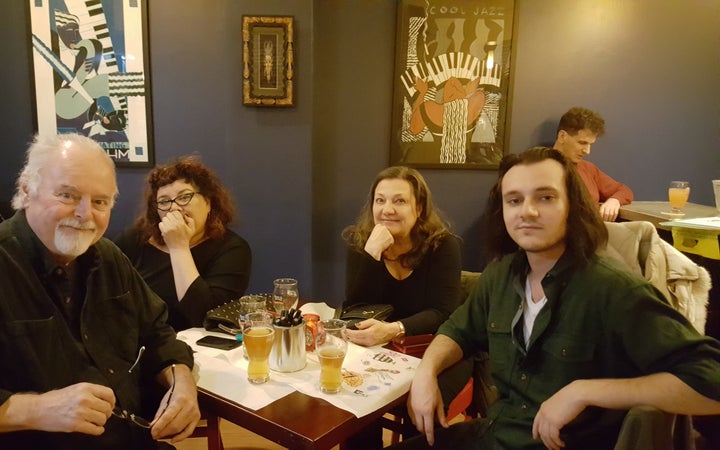 (l to r) Bob Bond, Cat DeLeon, Carol Jefferson, her son Eli and David Byman (rear) at the White Rose Coffeehouse, Lynn, Mass.