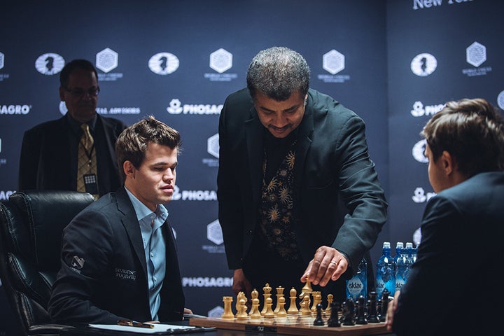 Neil deGrasse Tyson plays the ceremonial first move in game 8