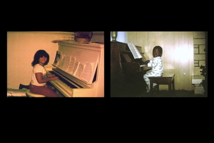 <p>A Small World, 1999-2001, Sanford Biggers and Jennifer Zackin. Single-channel projection (color, silent) DVD, carpet, sofa, wood panel walls.</p>