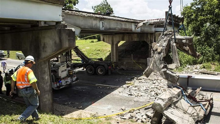 Texas transportation workers in July survey the damage from a bridge collapse in which a child died. President-elect Donald Trump has proposed fixing dilapidated infrastructure.