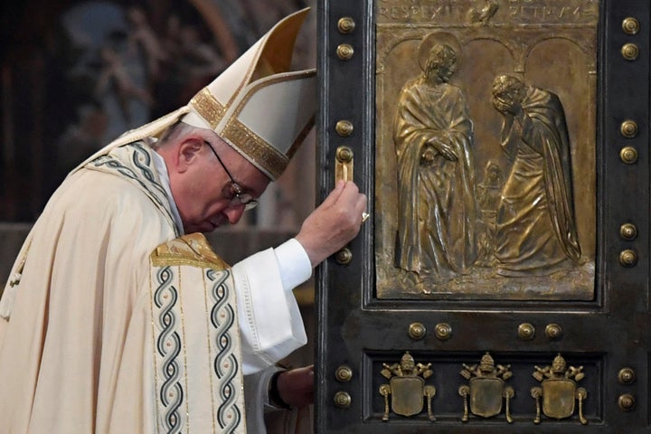 Pope Francis closes the Holy Door to mark the closing of the Catholic Jubilee Year of Mercy in the Saint Peter's Basilica at