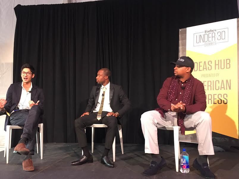 Belbase (left) and Bannister (right) speaking at the Forbes 30 Under 30 Summit in October 2016.