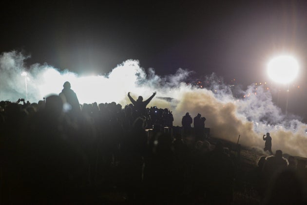 Police use tear gas against demonstrators near the Standing Rock Indian Reservation in North Dakota on...