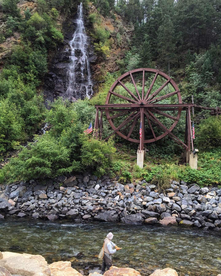 An old water wheel along Clear Creek in Idaho Springs