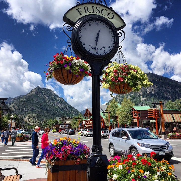 <p>There are flower baskets on every corner of Frisco.</p>