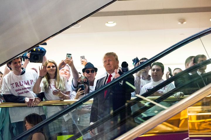 Business mogul Donald Trump rides an escalator to a press event to announce his candidacy for the U.S. presidency at Trump Tower on June 16, 2015 in New York City.
