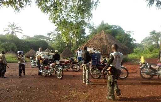 A mobile team from Doctors Without Borders arrives in a village in the northeast region of the Democratic Republic of Congo to start active screening for sleeping sickness. All material is carried by motorbikes because it is not possible to reach remote villages by car.