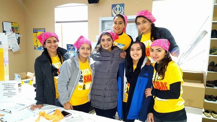 Volunteers participate in the Nanak Naam Jahaj Gurudwara's "Let's Share A Meal" event.