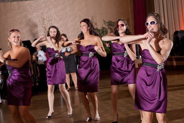<strong>15. Dedicate a special song to your 'maids and groomsmen. </strong> Don't require them to practice a dance beforehand, unless you're Zumba buddies or were in a dance troupe back in high school! Just have your DJ or band play a song from your past and watch unscripted hilarity ensue. <br><br><strong>Related:</strong><a href="http://www.bridalguide.com/planning/the-details/photo-video/choreographed-wedding-dances" target="_blank" role="link" rel="nofollow" class=" js-entry-link cet-external-link" data-vars-item-name="All Together Now: Choreographed Wedding Dances That Make Us Smile" data-vars-item-type="text" data-vars-unit-name="5835c410e4b0a79f7433b31f" data-vars-unit-type="buzz_body" data-vars-target-content-id="http://www.bridalguide.com/planning/the-details/photo-video/choreographed-wedding-dances" data-vars-target-content-type="url" data-vars-type="web_external_link" data-vars-subunit-name="article_body" data-vars-subunit-type="component" data-vars-position-in-subunit="11">All Together Now: Choreographed Wedding Dances That Make Us Smile</a>