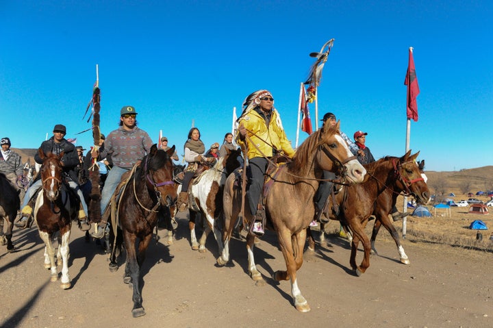 Horse riders from the Bigfoot Riders, Dakota 38 Riders, Spirit Riders and the Bigfoot Youth Riders arrive at the Oceti Sakowin camp.