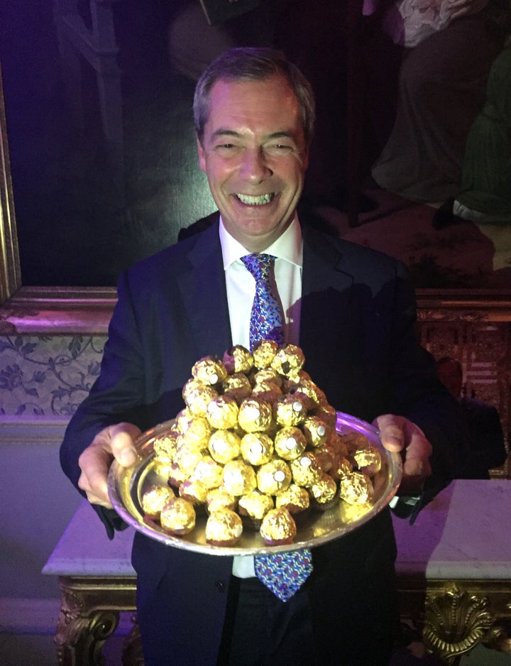 Nigel Farage is presented with a tray of Ferrero Rocher chocolates at an event to thank him for his contribution to Brexit, at The Ritz, London.