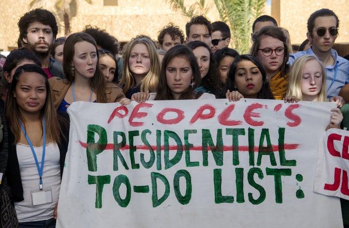 American students protest outside the UN climate talks during the COP22 international climate conference in Marrakesh, Morocco, in reaction to Donald Trump's victory in the U..S presidential election, on Nov. 9.