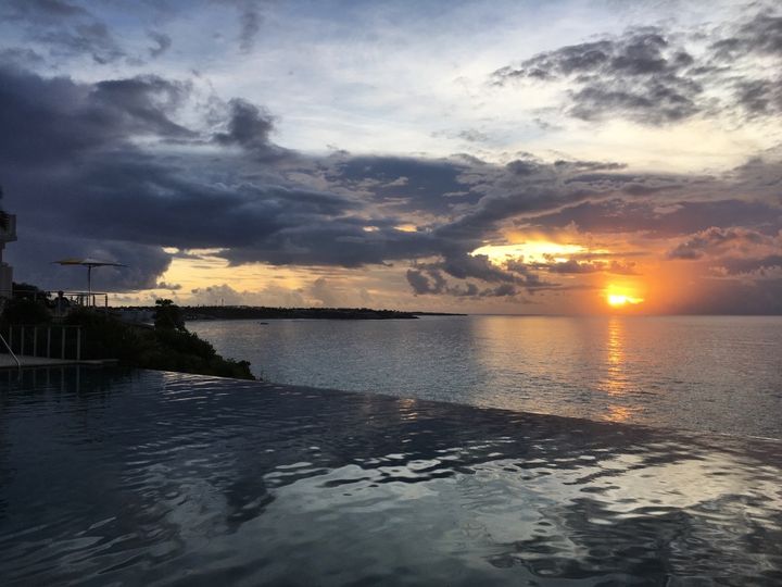 Sunsets from the infinity pool at Mallihouana