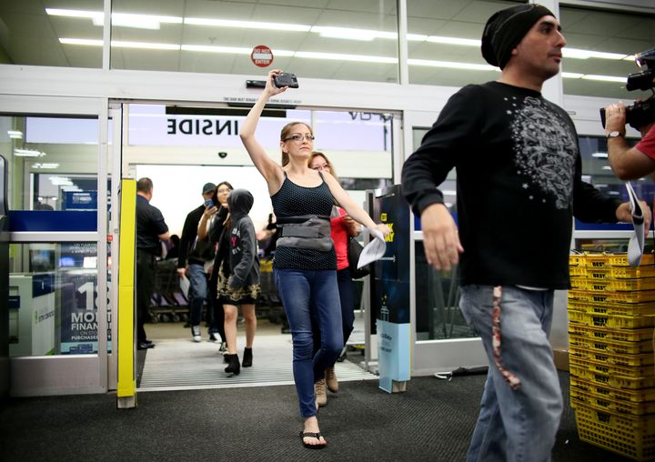 Shoppers enter Best Buy during Black Friday sales in San Diego, California