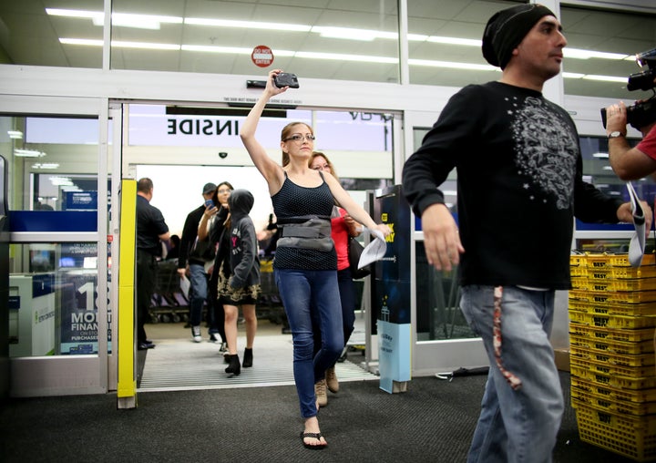 Shoppers enter Best Buy during Black Friday sales in San Diego, California