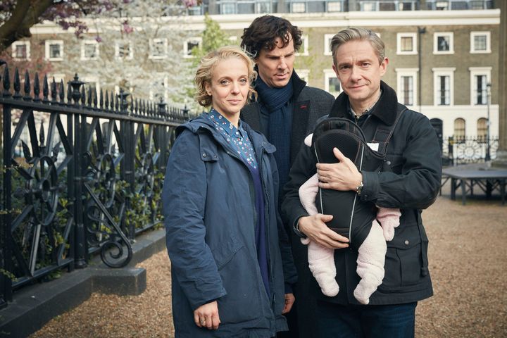 Sherlock Holmes (Benedict Cumberbatch) doesn't look too impressed by the Watsons' new bub
