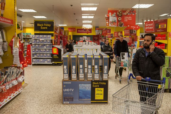 <strong>Punters attend the 5am opening of very carm and ordered black friday at Tesco extra, Bristol.</strong>