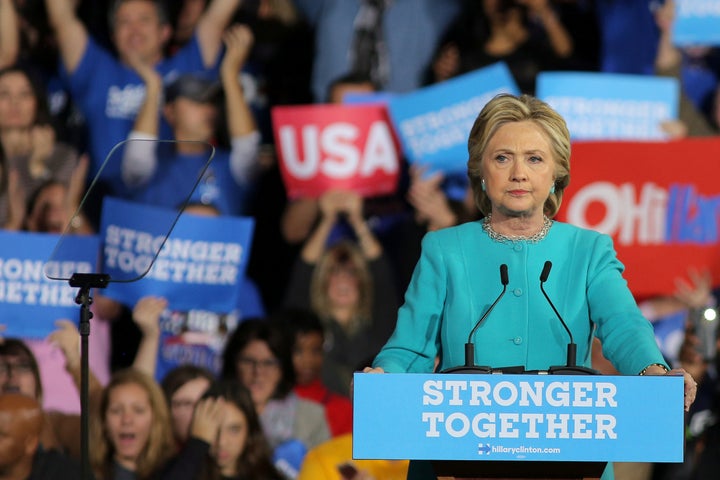 U.S. Democratic presidential nominee Hillary Clinton pauses as she speaks during a campaign rally in Cleveland, Ohio, U.S., November 6, 2016.