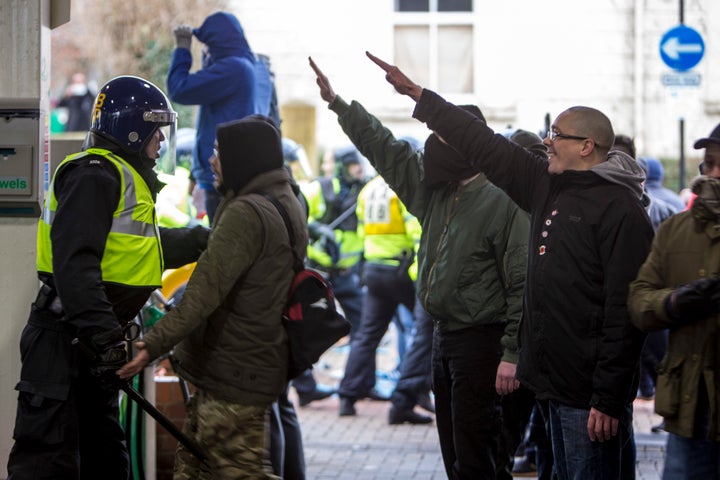 Fascist demonstrators show the Nazi salute in Dover during clashes with anti-Fascist demonstrators