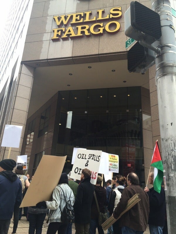 In Baltimore ‘water protectors’ rally in solidarity with folks at Standing Rock against the Dakota Access Pipeline. Protestors demanded that Wells Fargo divest from DAPL and closed down Wells Fargo with a sit-in ending with arrest of 6, on November 25 2016