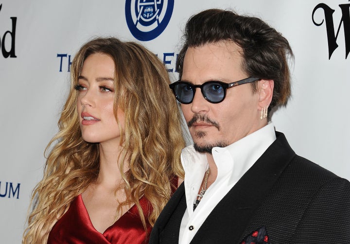 Depp and Heard attend an event together in January 2016. 