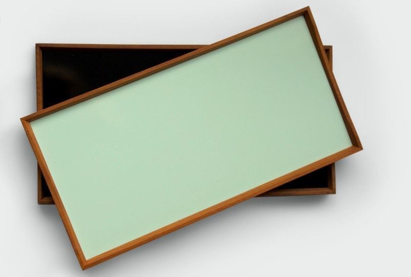<a href="http://architectmade.com/shop/finn-juhl/turning-tray/" target="_blank">Turning Tray by Finn Juhl,</a> $199 - $269