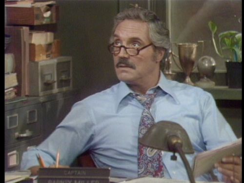 Hal Linden as the kindhearted Captain of the 12th Precinct, Barney Miller.