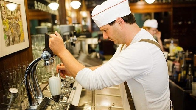 Peter Freeman, the “head jerk” at Brooklyn Farmacy and Soda Fountain, says a New York ban on credit card surcharges violates