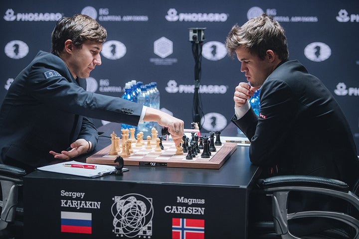 Sergey Karjakin captures Magnus Carlsen’s knight in game 11