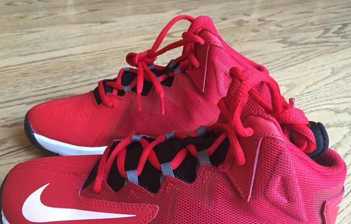 Red sneakers purchased in memory of Oakley Debbs on November 28, 2016.