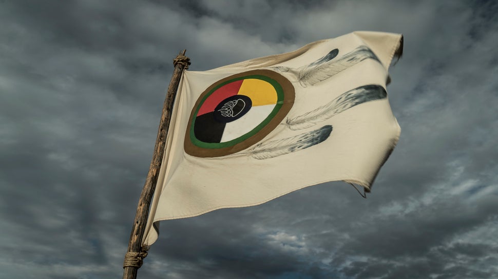 This flag represents one of hundreds of tribes who have come together in a historic gathering at Standing Rock to stand in so