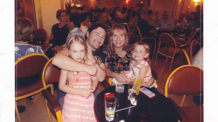 George Maxwell with his wife Sarah and their two daughters Summer, nine, and Cadence, six.