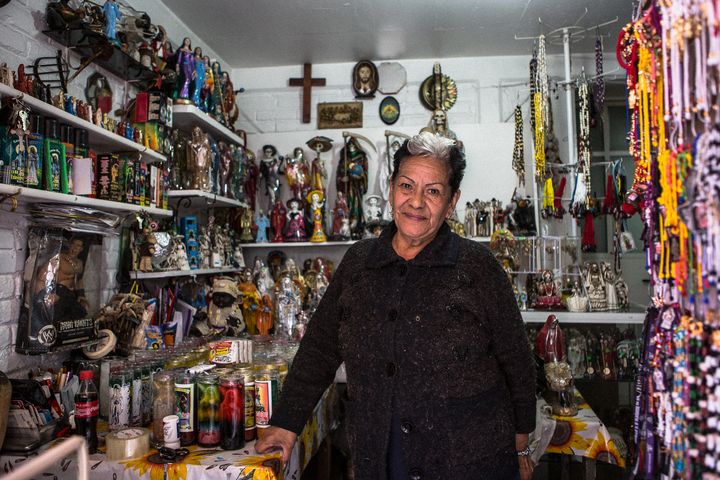 <p>Enriqueta Romero, the Godmother of Santa Muerte devotion, at her shop in Tepito</p>