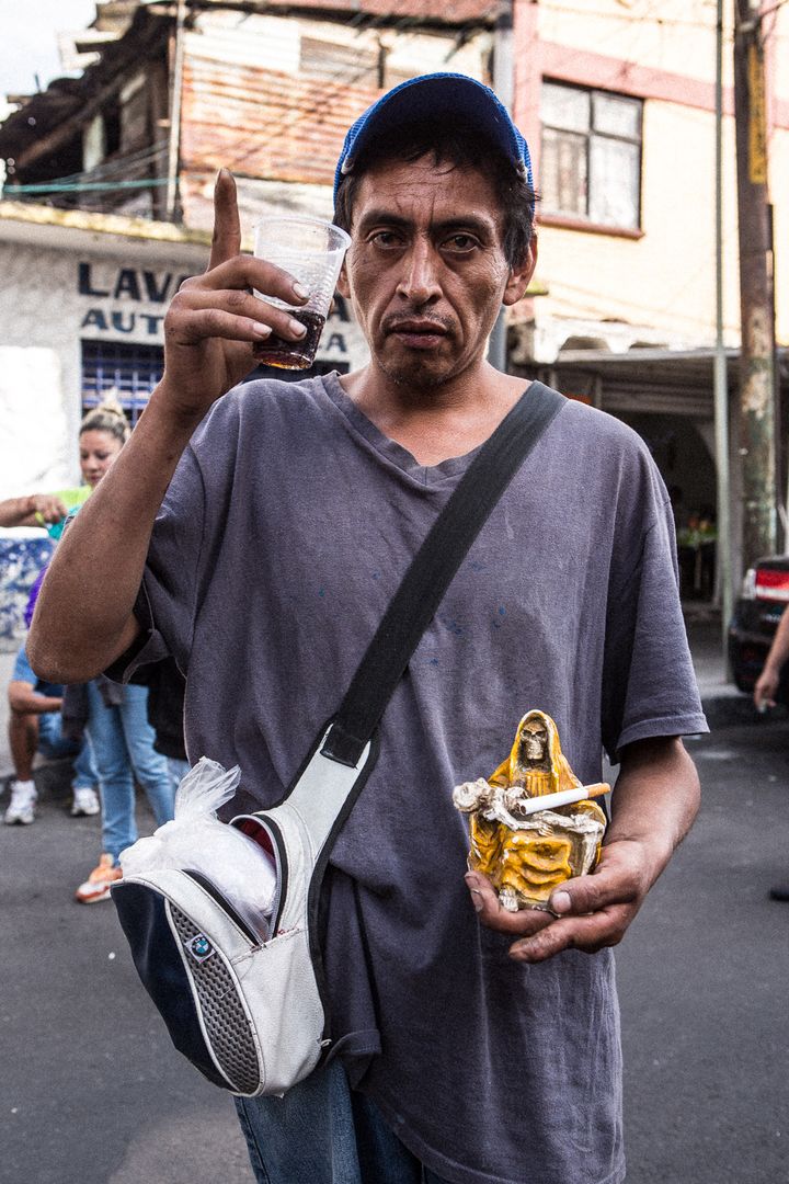 Santa Muerte devotee who brought his Bony Lady to be blessed at the Tepito shrine
