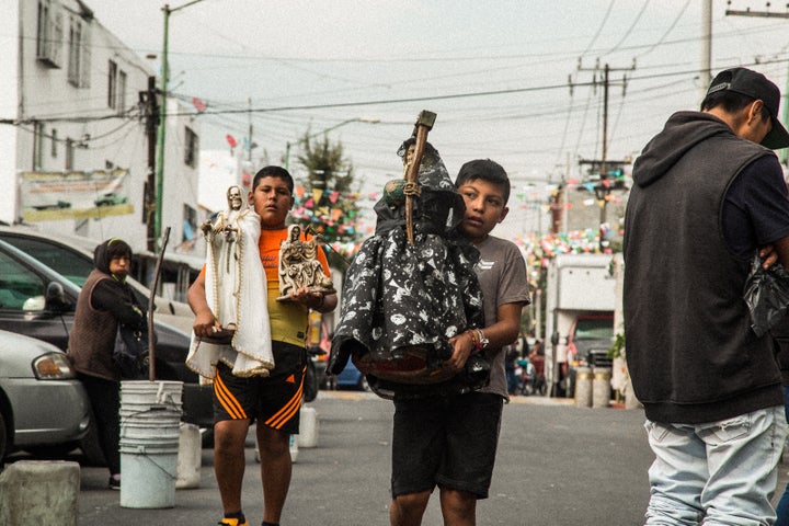 Boys with Bony Ladies on their way to the Santa Muerte shrine in Tepito