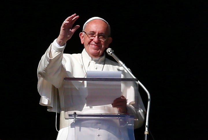 Pope Francis leads his Sunday Angelus prayer in Saint Peter's square at the Vatican November 27, 2016.