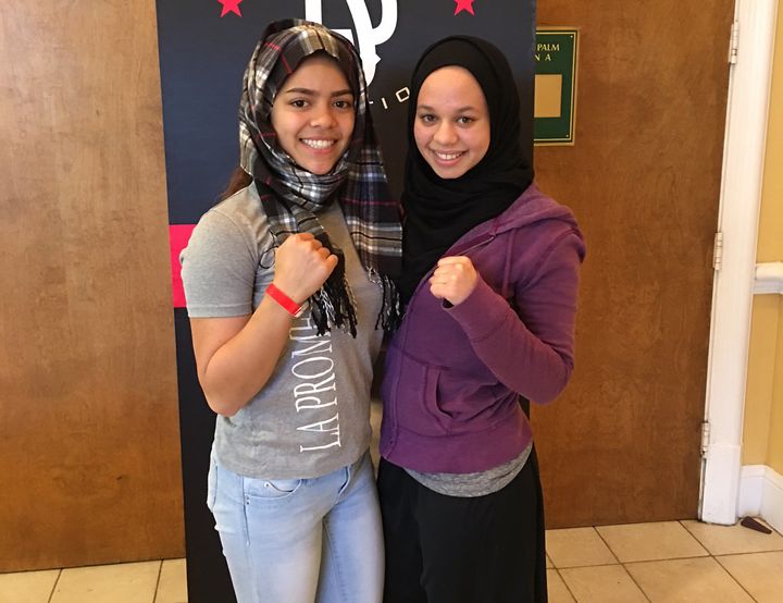 Aliyah Charbonier (left) wears a scarf to show solidarity with Amaiya Zafar.