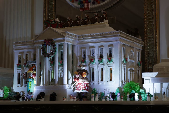 The White House Gingerbread House sits in the State Dining Room.