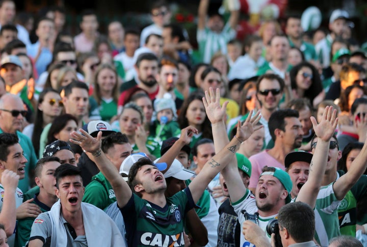 Fans of Chapecoense soccer team gather in the streets to pay tribute to their players in Chapeco, Brazil