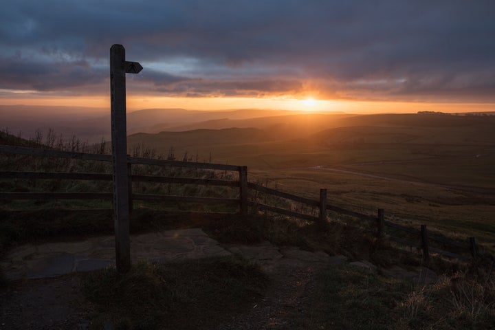 The sun rises over the Peak District and the Hope Valley in Chapel en le Frith, England