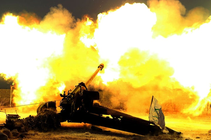 Syrian opposition members fire artillery as they attack the Assad regime forces in Kafr Hamrah village of Aleppo, Syria on November 29, 2016.