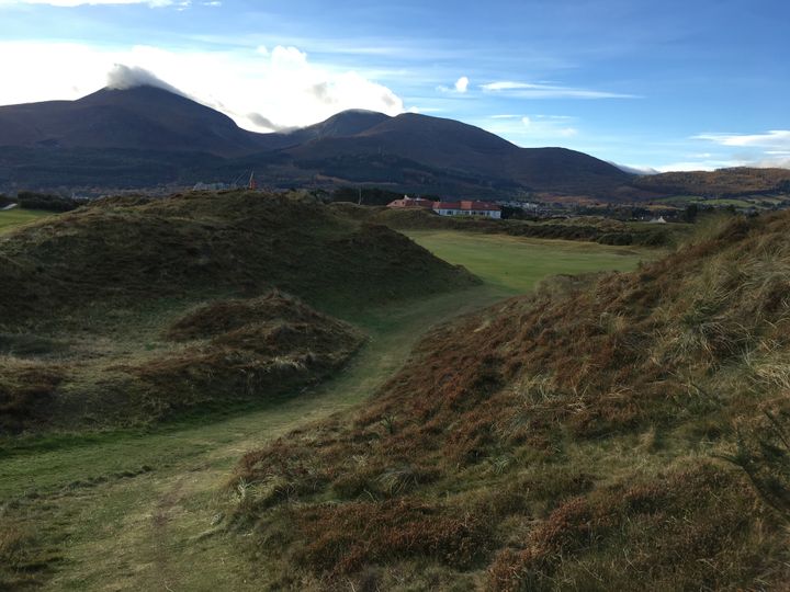 The walk down to the fairway after a blind tee shot on the unforgettable ninth hole at Royal County Down