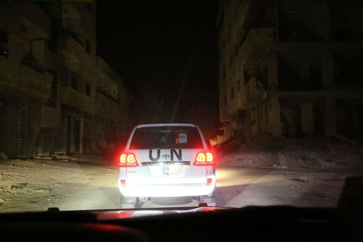 A convoy makes its way to deliver food to families in a besieged town.. 