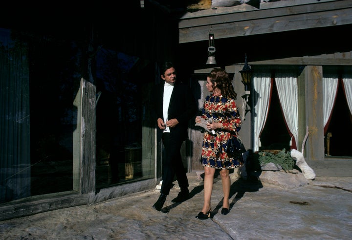 Johnny and June stroll on the patio, 1969.