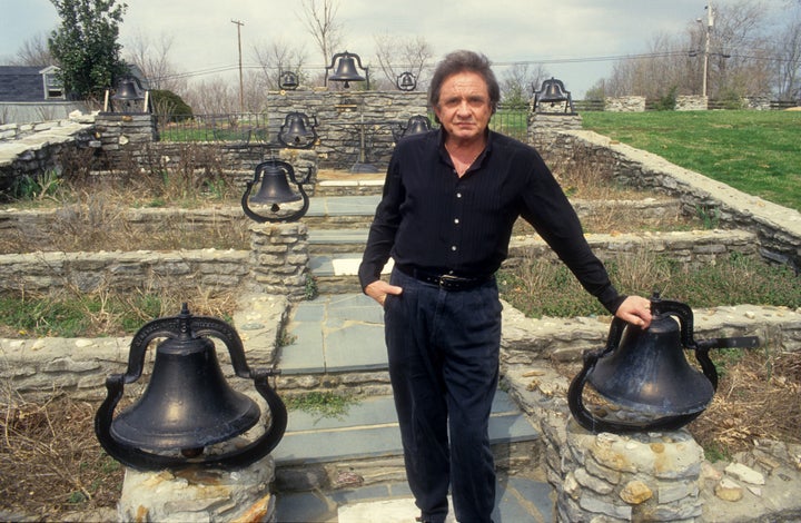 Johnny in the home's iconic "bell garden," 1988.