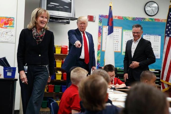 Then candidate-Trump visits an elementary school classroom.