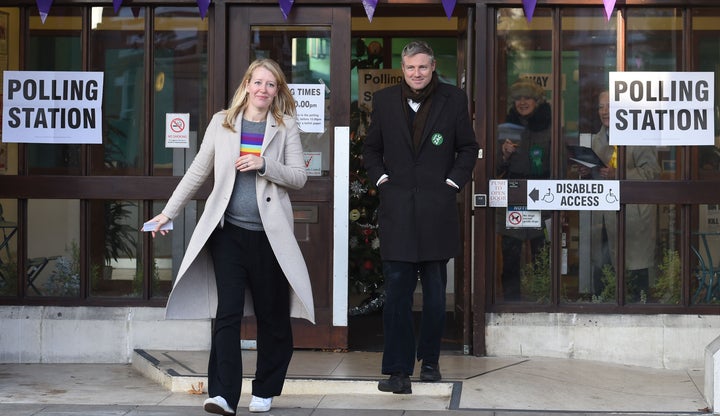 Zac Goldsmith with his wife Alice after voting at a polling station in Richmond today