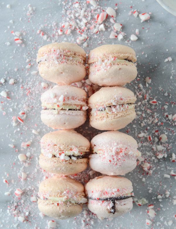 Pink peppermint bark macarons from How Sweet It Is