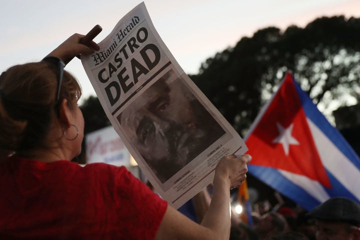 People celebrate the news of Castro's death in Miami on Nov. 26.